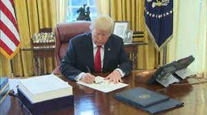 Image result for trump signing tax reform bill