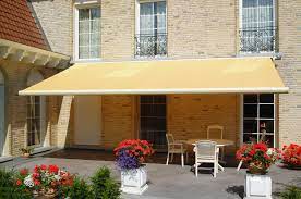 When Your Retractable Awning Is Fully Closed It Can Be In A Tube To Protect From The Elements Windows Exterior Window Shades House Yard