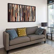 Although unpainted furniture might seem too easy and plain, there are lots of ways that we're able to do in order to make them look more cool. Sea Crest Wood Wall Art In Living Room Living Room Decor Reclaimed Wood Furniture Wall Art Living Room