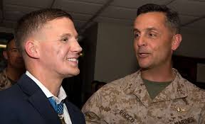 Cpl. William “Kyle” Carpenter, left, Medal of Honor