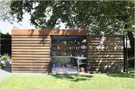 Architect Visit A Stylish Garden Shed With A Secret Gardenista Backyard Sheds Garden Tool Shed Shed Design