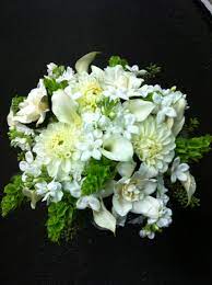 Bridal Bouquet With Stephanotis Bells Of Ireland Gardenias Dalias Stock Etc Pauline S Bloomers Wedding Flowers Irish Wedding Wedding Flower Packages