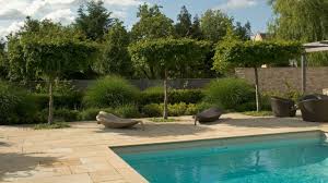 Small pool backyard ideas and tips on a budget. Pool Landscaping Ideas The Best Materials To Use In And Around A Backyard Pool Country