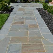Build the trellis for the gate. Flagstone Irwin Stone