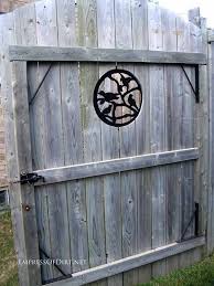 Much like the front door to your house, the gate to your backyard should also be warm and welcoming so guests feel comfortable coming in. 25 Ways To Dress Up A Fence With Garden Art