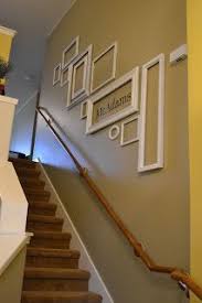 Assorted Empty Monochromatic Frames I Think I Ll Do This Down To The Basement Playroom And Put The Kids Art Wor Home Decor Decorating Stairway Walls Home Deco