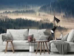 Bring nature into your home with a beautiful printed mural wallpaper presenting a forest landscape with sun rays breaking through trees. Misty Morning Forest Wall Mural Into The Woods Wallpaper Etsy Mountains Mural Forest Wall Mural Wall Murals