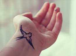 This tattoo is also funny because of the loser word and is perfect for guys who like funnier designs! 125 Adorable Bird Tattoo Designs For The Bird Lover