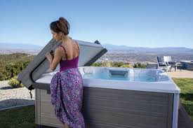 It's one of our favorite pastimes; Protecting Your Hot Tub In The Rain And Other Inclement Weather Hot Spring Spas