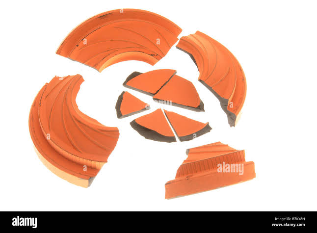 broken clay pigeon on white Stock Photo - Alamy