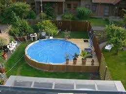 Quite An Undertaking Surround Deck For Intex Ultra Frame Backyard Pool Landscaping Best Above Ground Pool Pool Designs
