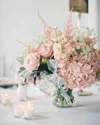 Wedding flower arrangements go beyond the basic centerpieces and bouquets. Diy Wedding Ideas Pink Wedding Centerpieces Wedding Flower Arrangements Wedding Centerpieces