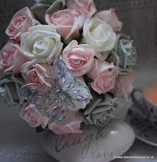 Maybe you would like to learn more about one of these? Butterfly Bridesmaid Posy Pink Silver And Ivory Wedding Flowers Pink Wedding Theme Bridal Flower Arrangements Ivory Wedding Flowers