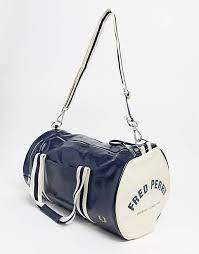 From low prices to high fashion brands, the online shop for bags. Fred Perry Sac De Sport Classique Bleu Marine Asos