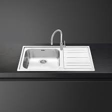 The sink can be integrated using the same material as the worktop and you can choose to have it the same colour or in white, bone or whatever colour. Smeg Kitchen Sinks Stainless Steel Composite Ceramic Inset Undermount