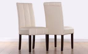 Available in a set of two, each chair measures in at 18.5 by 22.25 by 31.5 inches and is extremely durable. Carrick Ivory Leather Dining Chair Wenge Leg Dining Chairs Furniture Choice Leather Dining Chairs