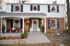 Check spelling or type a new query. Classic Christmas Decorations Colonial House With Wreaths On Windows Wreaths On Exterior Window Colonial House Large Wreath On House Exterior Christmas House