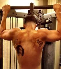 Most of his tattoos have been inked on his big muscular arms which have different meanings. Tatted Up Drake Shows Off His Back Tattoos Vibe Com