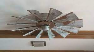 First, place steel banding around the middle of the ceiling fan base. Attached An Old Windmill To My Ceiling Fan Love It Windmill Ceiling Fan Windmill Fan Farmhouse Ceiling Fan