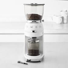 Purchase smeg's recommended descaler here:usa: Smeg Coffee Grinder Williams Sonoma