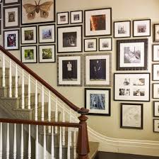 Puzzled by how to hang pictures in stairs or corners? 3 Tips For Hanging Art On A Stairway