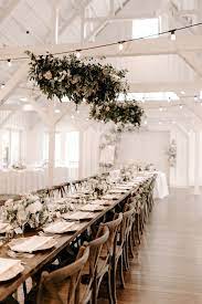 Neutral And Natural Tulsa Wedding Inspired By The White Barn Venue At Spain Ranch Junebug Weddings Elegant Wedding Venues Barn Wedding Reception White Barn