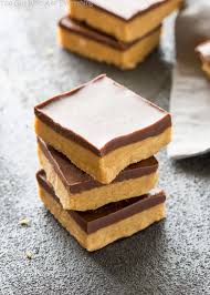 The added layer of chocolate makes these keto peanut butter bars taste just like a reese's peanut butter cup! Homemade Reese S Bars The Girl Who Ate Everything