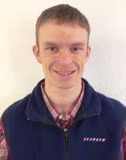 Assistant Professor Sadanand Dhekney describes his winter- hardy grape  rootstock research during the Powell Research and Extensi