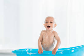 Baby taking a bath clipart. Toddler Kid Taking Bath And Smiling In Blue Plastic Baby Bathtub Free Stock Photo And Image