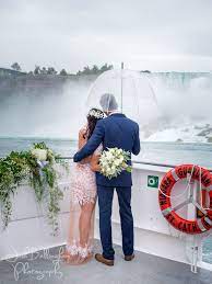 Gorgeous Photo Of Bride And Groom Gazing At Niagara Falls Stunning Wedding Photography At One Of The Niagara Wedding Fall Wedding Photos Niagara Falls Wedding