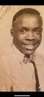 Tim Prosser. I've added a correction to this photo.