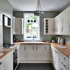 This minimalist kitchen is a lovely balance of light and dark. 6 Top Brown Kitchen Countertops With White Cabinets Dream House