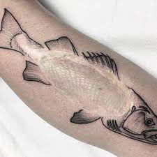 A tattoo artist uses a gun to insert pigments into the skin's top layer through pricks. Tattooing Over A Scar Everything You Need To Know Saved Tattoo