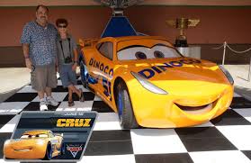 A page for describing characters: Cruz Ramirez From Cars 3 Rolls Into Disney Theme Parks For Meet And Greets The Disney Blog