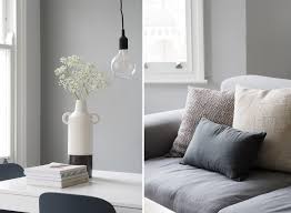 Artwork and kitchen accessories repeat the room's color scheme. New Interior Project A Light Filled Minimalist Kitchen And Living Room