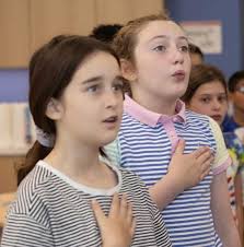 1. Ethan Zhou (left) grins in disbelief as he realizes his opponent Lev  Edelman has placed him in checkmate while Jason Smith looks on. The  Bromfield seniors attended the Pavilion Party held