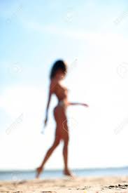 Nude walking on the beach