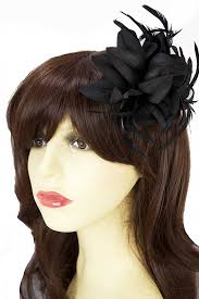 It's a great choice for a retro look, and you can even try it with a modern twist by using less product and parting your hair to the side. Black Flower Feather Clip Fascinator Black Hair Clips