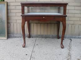 Bombay Company Glass Display End Table Features Queen Ann Style Legs And Brass Fittings On Pull Out Document Drawer Beautiful End Tables Table Glass Panels