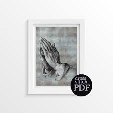 Free cross stitch patterns that everyone can download and on the other hand expert enthiusuasts can indulge in the latest fashion patterns like the oriental designs. Praying Hands Cross Stitch Pattern The Art Of Cross Stitch