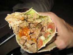 Beef burrito and taco with beans and rice. Filibertos Near Me