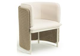 It sits on straight, solid mango wood legs in a gray finish to match. Esedra Ethimo Dining Armchair Milia Shop