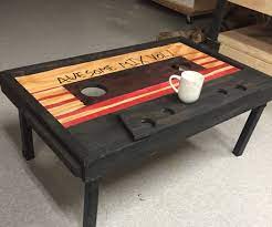 The dark brown finish add depth to its wooden texture, showcasing a great piece of artistry. 50 Cassette Tape Coffee Table Guardians Of The Galaxy Upcycled Furniture Diy Contemporary Living Room Furniture Furniture Diy