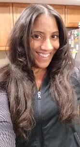 Flat ironing super thick curly hair