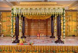 Traditional Classy South Indian Wedding Mandap Decor With Flowers And Bells Wedding Stage Decorations Traditional Wedding Decor Wedding Backdrop Decorations