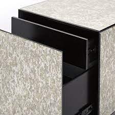 Hang it as an accent in a hallway or make it the main piece in your living room. Foxed Mirror Side Table