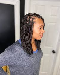 This hairstyle will look really good on a circular face. 40 Knotless Braid Styles For 2021 Jumbo Lose Braid More Thrivenaija In 2021 Short Box Braids Box Braids Styling Braid Styles