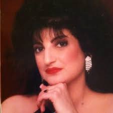 Yup, that's me!!! The infamous glamour shot!! I can't remember if I was in  middle school or high school, but either way, pretty scary, lol! Tonight