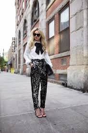 5 Styling Tips To Hide Your Happy Tummy For The Holidays Glam Radar Eve Outfit Sequin Pants New Years Eve Outfits