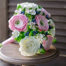 Resembling pom poms you will only need 2 or three of these guys for a full bouquet. Ranunculus Wedding Bouquet Handmade With Love Oriflowers